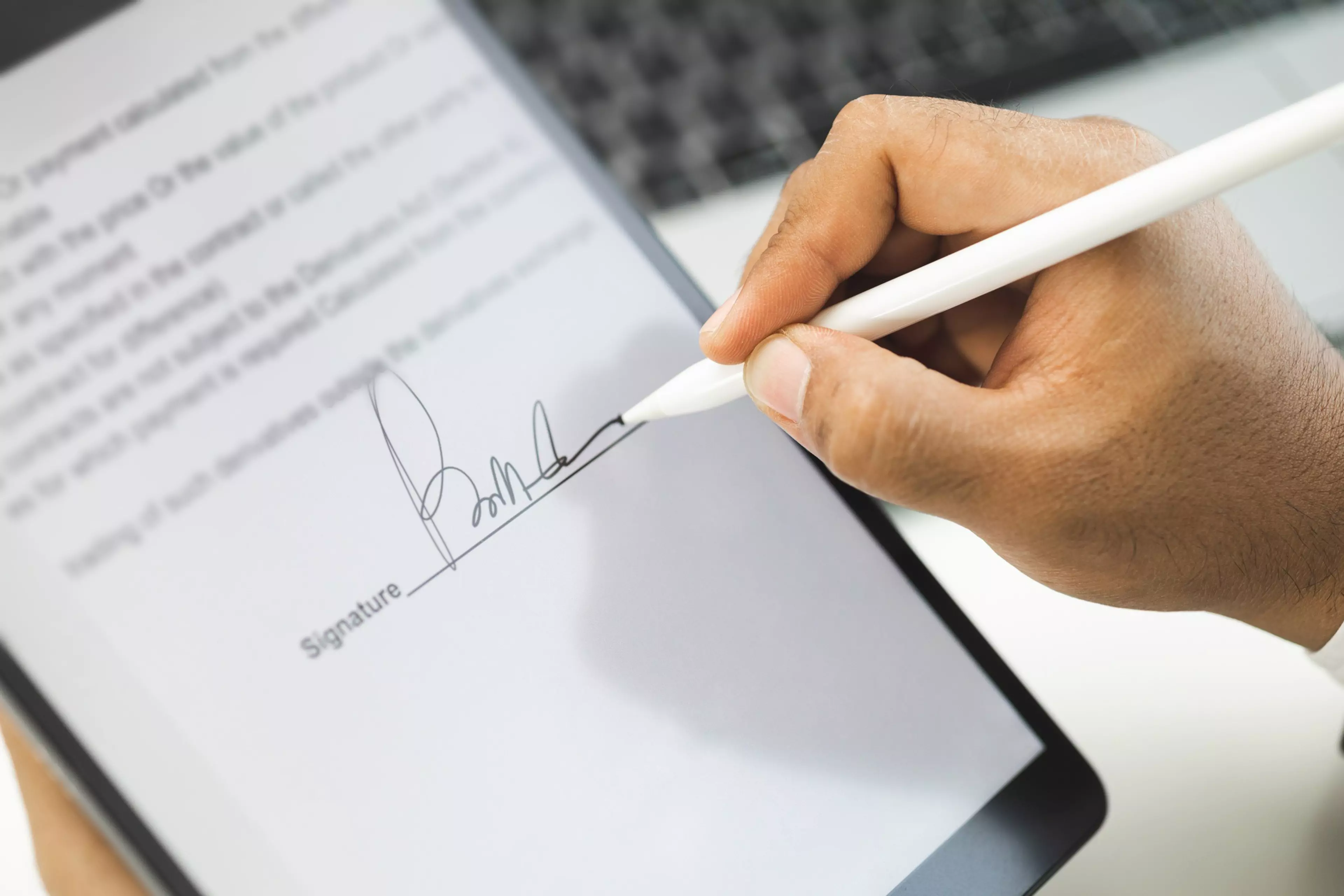 Close up businessman hand electronic Signature on Tablet by Stylus. Write business agreement of contract. Man signing contract on tablet. Business and technology concept.
agreement, application, applications, background, business, businessman, closeup, communication, confirm, contract, contracts, corporate, device, digital, document, e-signing, electronic, electronics, employee, equipment, finance, hand, handwriting, internet, male, man, management, manager, modern, network, office, online, pen, people, professional, screen, sign, signature, signing, smart, stylus, table, tablet, technology, touch, touchpad, website, work, working, write