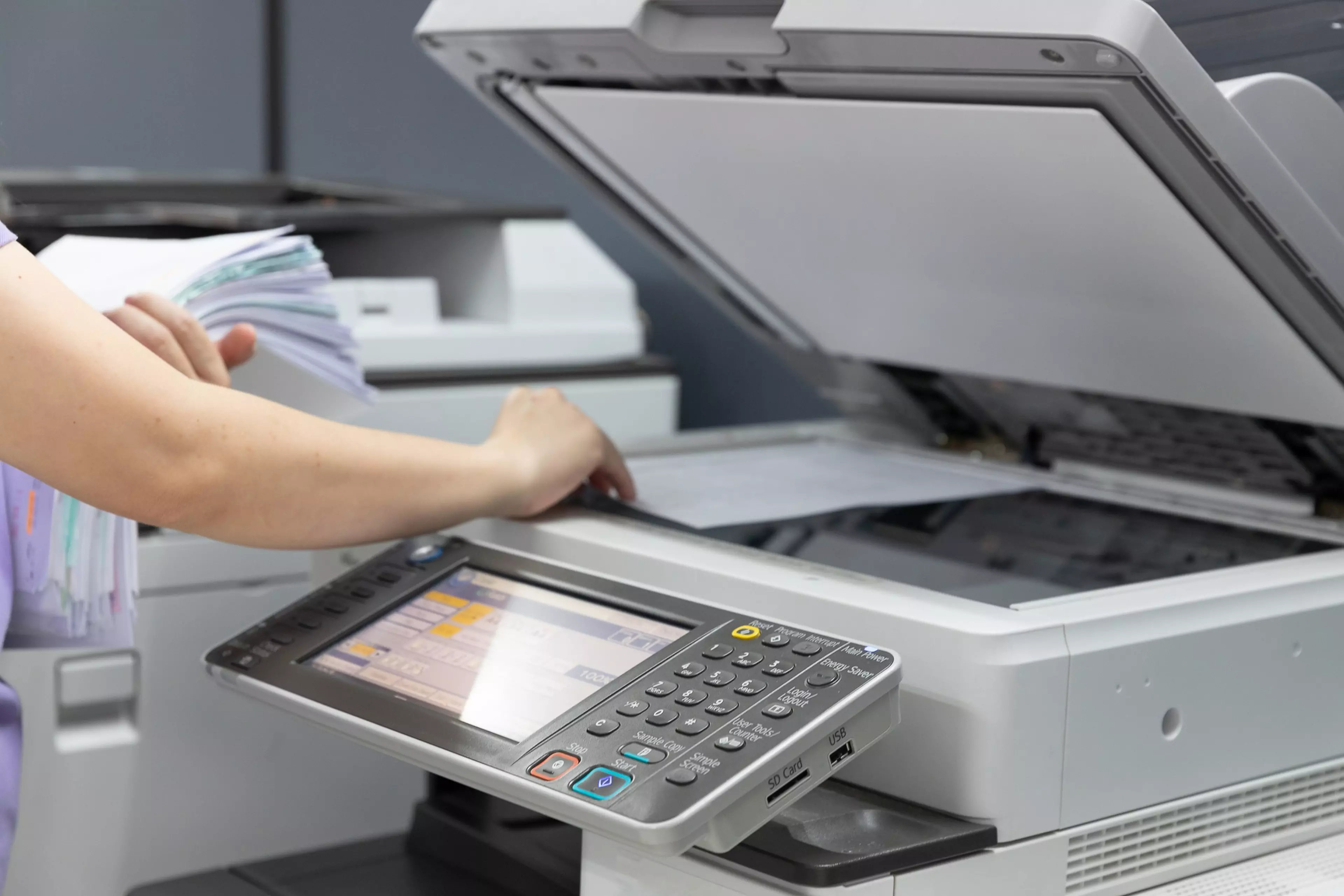 Bussinesswoman using copier machine to copy heap of paperwork in office.
printer, copier, scanner, document, office, scan, machine, paper, fax, print, woman, hand, secretary, business, copying, paperwork, photocopier, work, photocopy, businesswoman, copy, equipment, inkjet, laser, technology, stack, overwork, heap, accounting, media, manage, management, many, network, digital, colorful, button, worker, assistant, computer, industry, job, labor, education, stock, workload, chaos, data, busy, organization