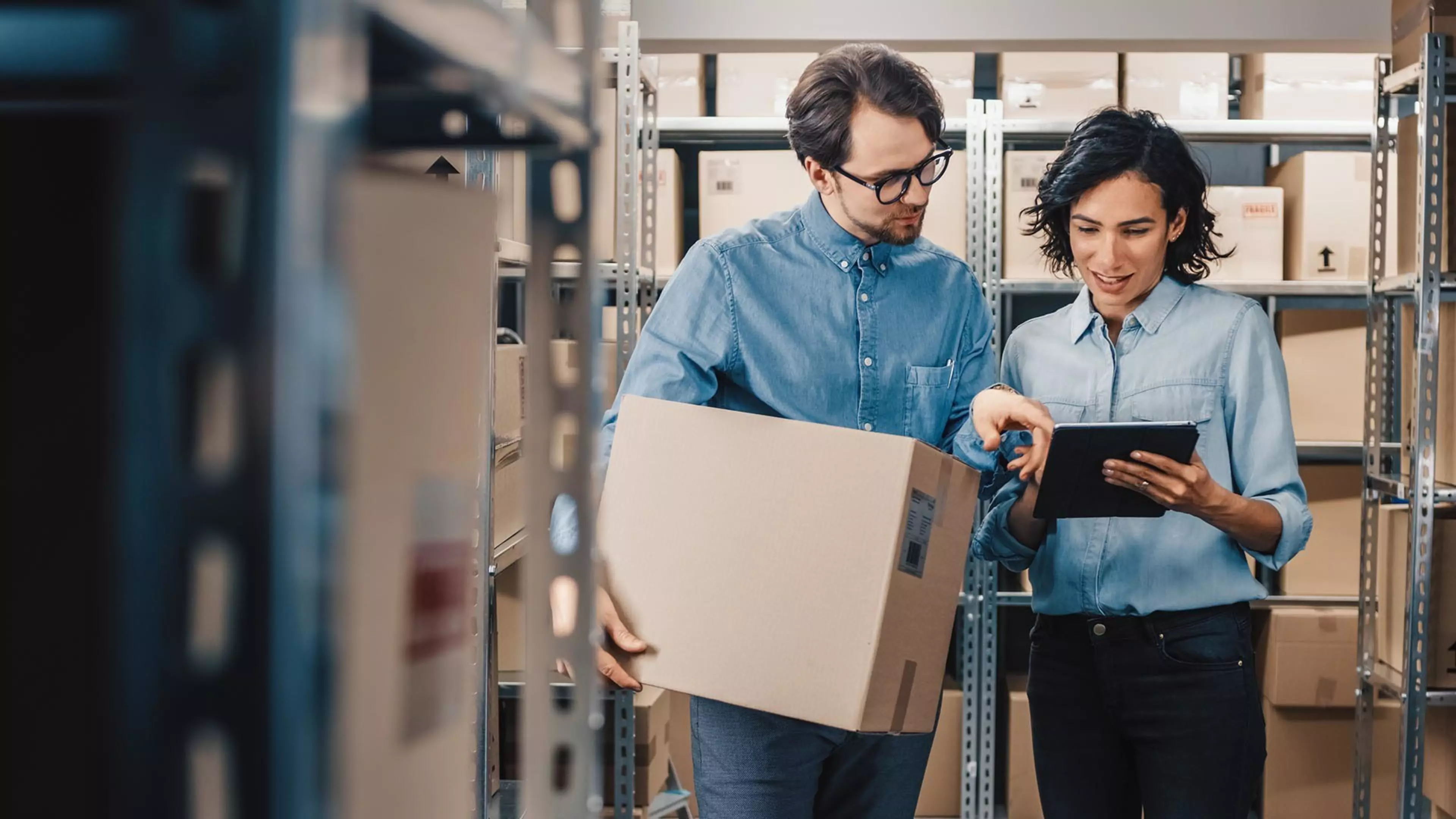 Female Inventory Manager Shows Digital Tablet Information to a Worker Holding Cardboard Box, They Talk and Do Work. In the Background Stock of Parcels with Products Ready for Shipment.; Shutterstock ID 1237494658; Purchase Order: CorpCom PP
1237494658
box,  business,  center,  checking,  commerce,  computer,  conversation,  delivery,  depot,  digital,  dispatch,  distribution,  employee,  export,  facility,  factory,  female,  goods,  internet,  inventory,  logistics,  mail,  man,  manager,  office,  order,  package,  parcel,  people,  postal,  professional,  retail,  room,  service,  shelves,  shipping,  shopping,  stock,  storage,  storehouse,  tablet,  talking,  using,  warehouse,  woman,  work,  worker,  cardboard box