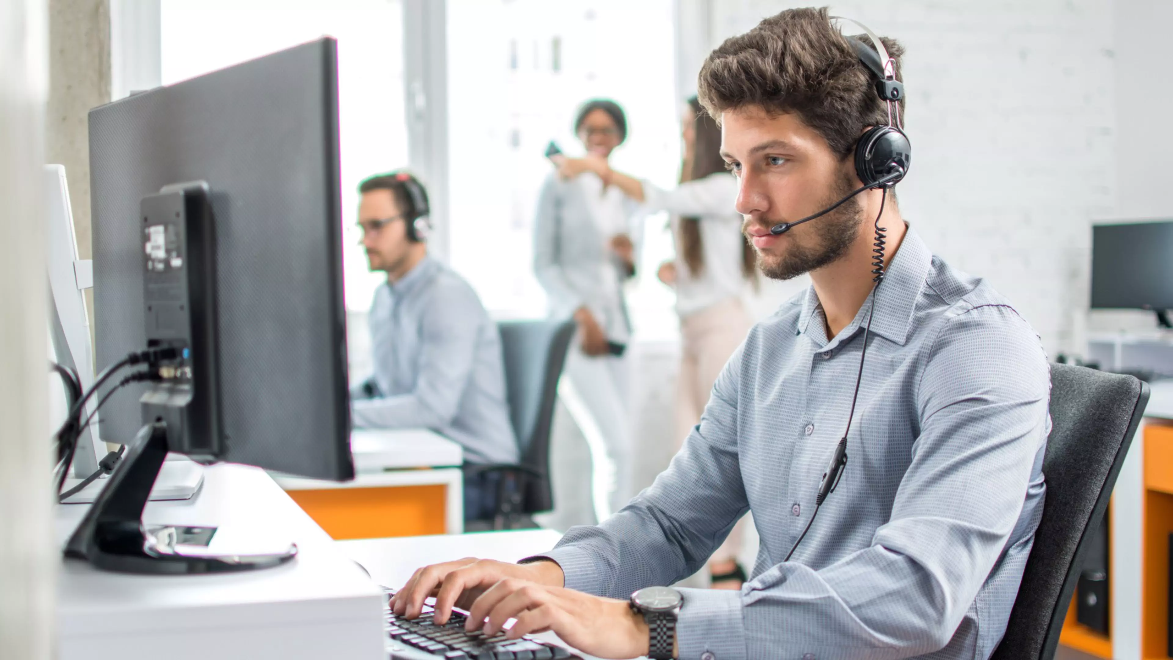 Young handsome male customer support phone operator with headset working in call center.; Shutterstock ID 722489089
adult,  agent,  answer,  assistant,  business,  businessman,  call,  caucasian,  center,  client,  communicate,  communication,  computer,  conference,  consultant,  corporate,  customer,  group,  headphones,  headset,  helpdesk,  male,  man,  microphone,  office,  operator,  people,  phone,  portrait,  professional,  receptionist,  representative,  sales,  secretary,  service,  sitting,  support,  talking,  team,  technology,  telemarketing,  telephone,  work,  worker,  workplace,  young,  call center,  call centre,  technical support,  using computer