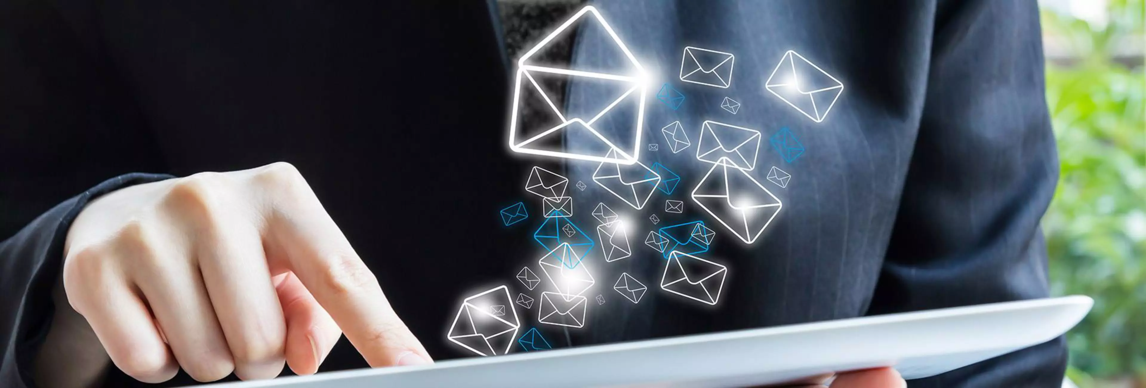 Businesswoman sending email
