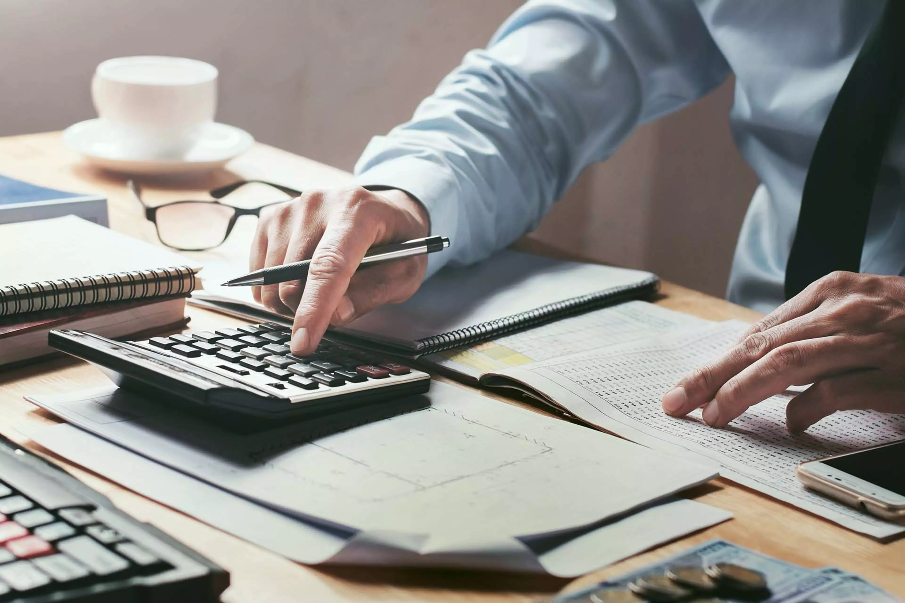 businessman working on desk office with using a calculator to calculate the numbers, finance accounting concept; Shutterstock ID 750073606; Purchase Order: CorpCom PP
750073606
account, accountancy, accountant, accounting, analysis, balance, banking, bookkeeper, business, businessman, calculate, calculation, calculator, capital, chart, closeup, coffee, computer, concept, data, desk, document, earnings, economy, expenses, finance, financial, funds, graph, growth, hand, income, invest, investment, management, market, marketing, money, office, paper, paperwork, pen, report, research, statistics, stock, tax, trade, work, workplace