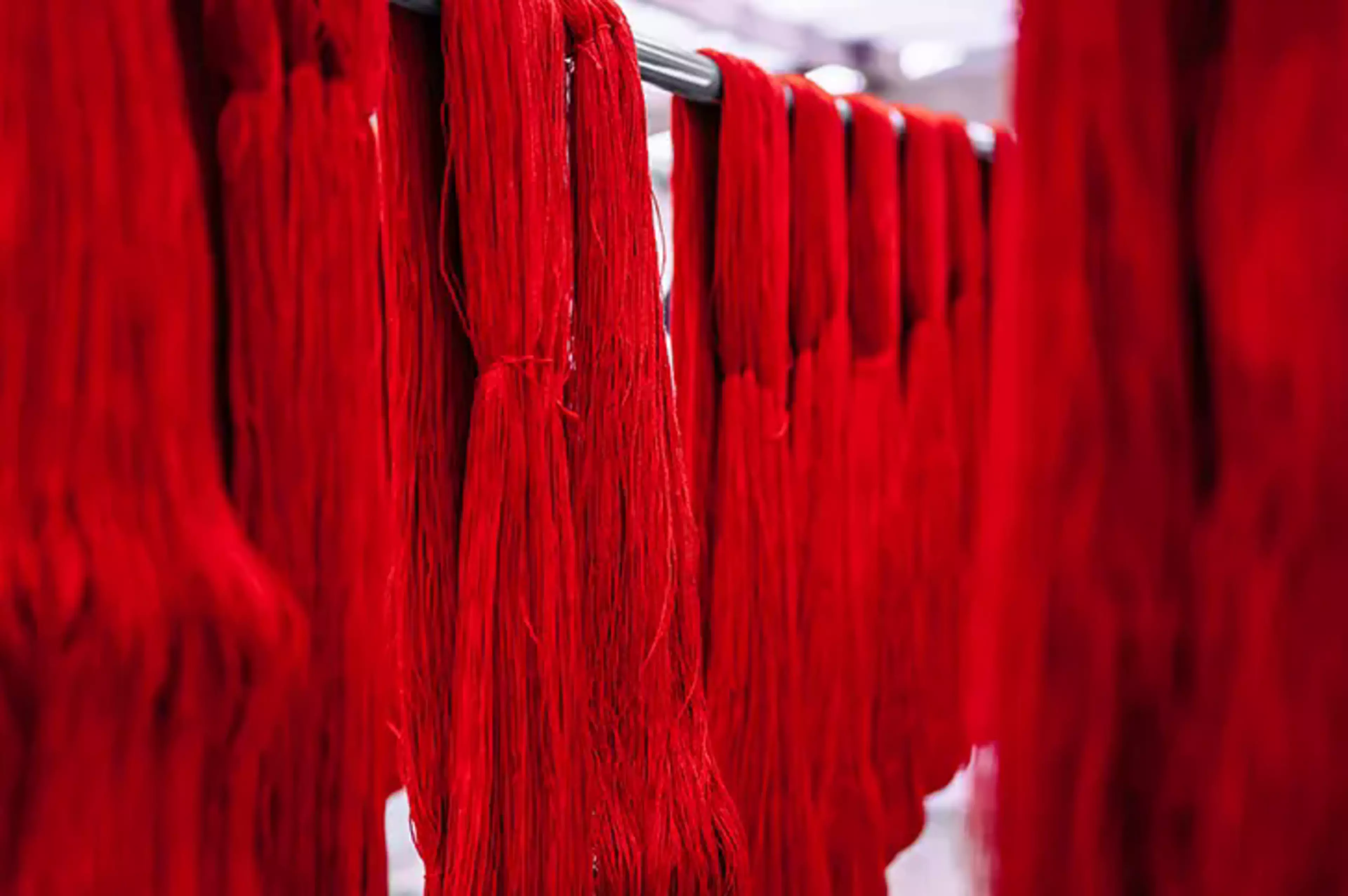 Dyed Red threads hanging