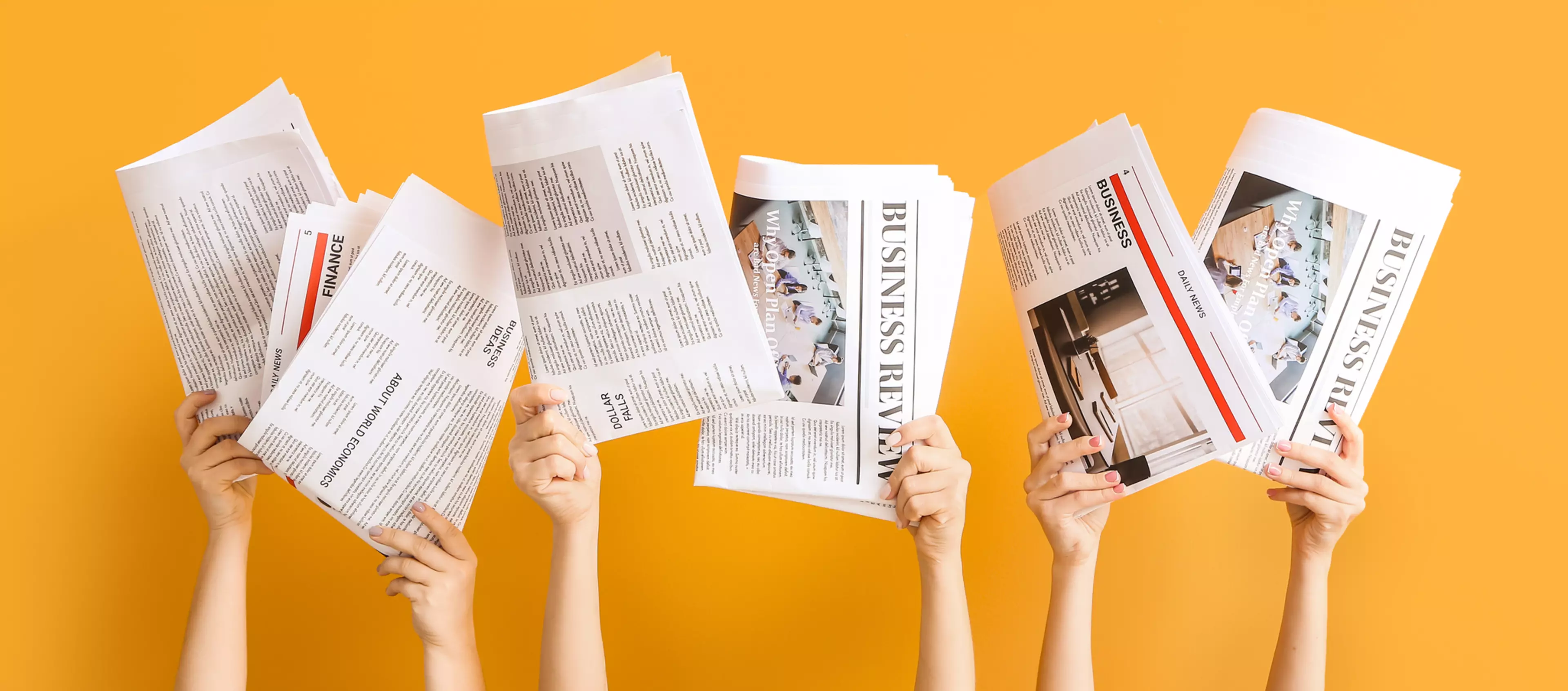 Female hands with newspapers on color background