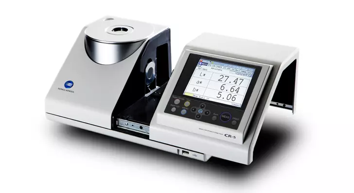 Benchtop Colorimeter CR-5 with its transmittance chamber open to measure the colour of solid and liquid samples